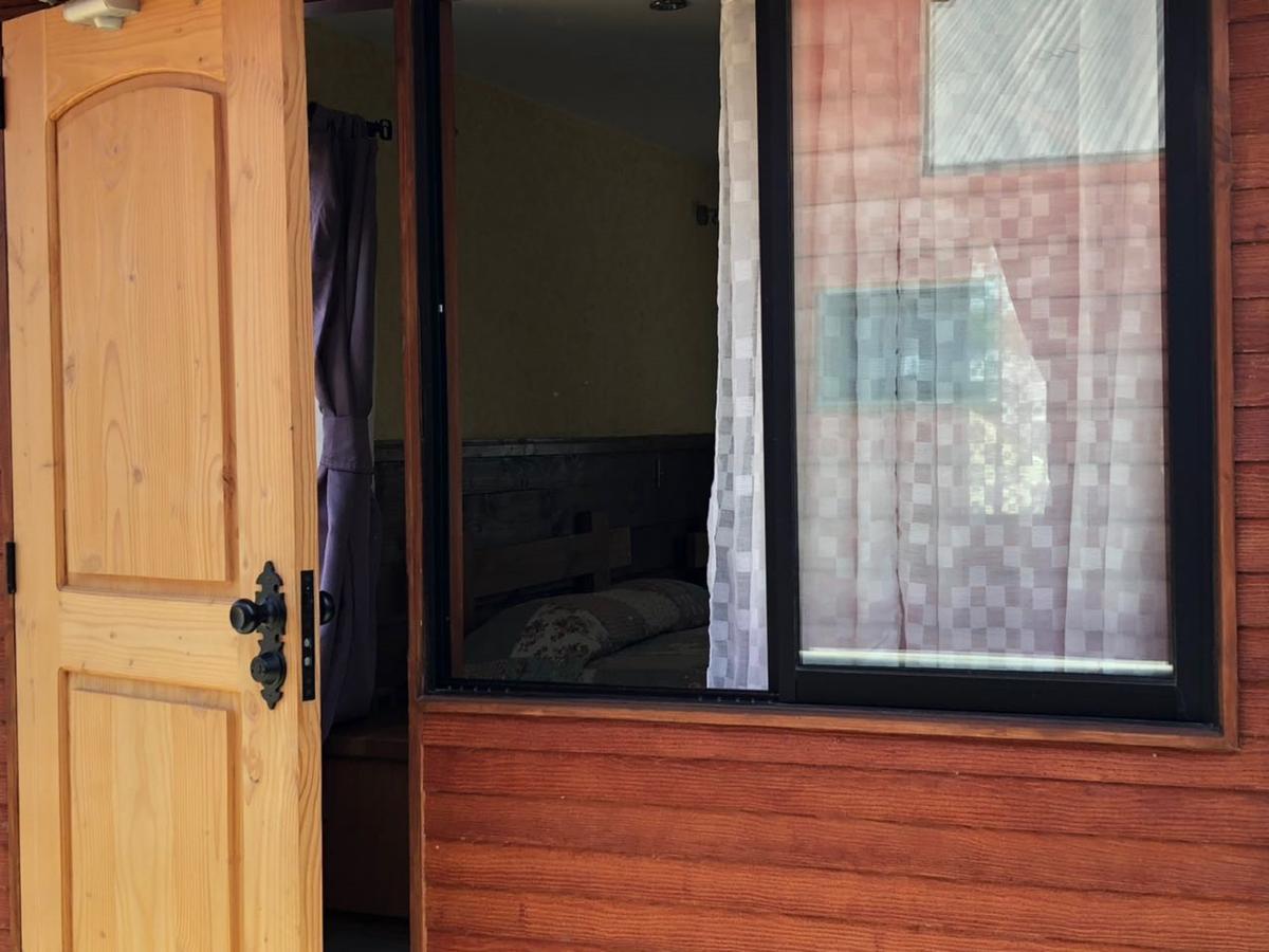 Hostal El Nogal Пукон Экстерьер фото